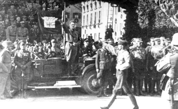 Adolf Hitler salutes the parade of the SA in Kelheim